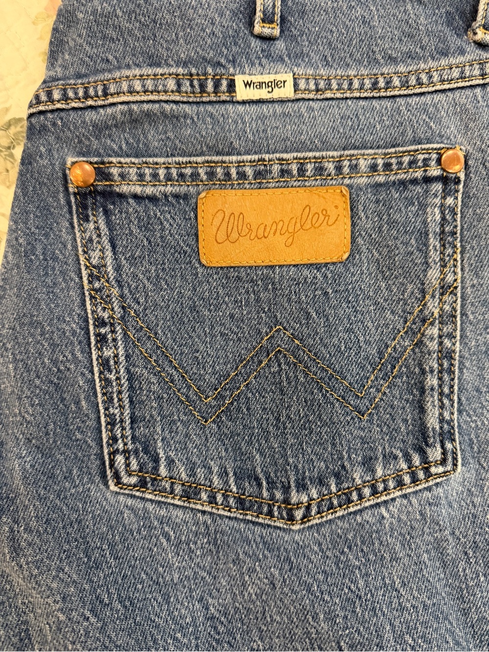 Wrangler Women’s Light Blue Denim Overalls with Tan Leather Patch